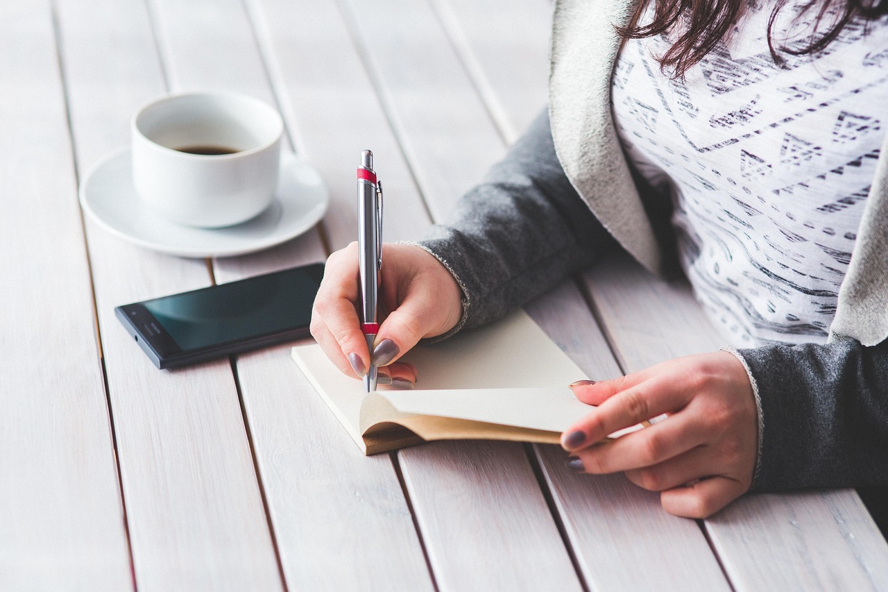 Woman, write, notepad — Steroids in the UK: The Facts Revealed