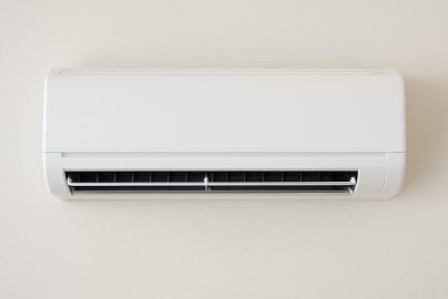 White air conditioning unit mounted on a wall