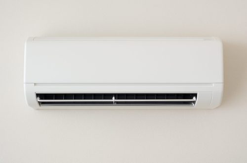 White air conditioning unit mounted on a wall