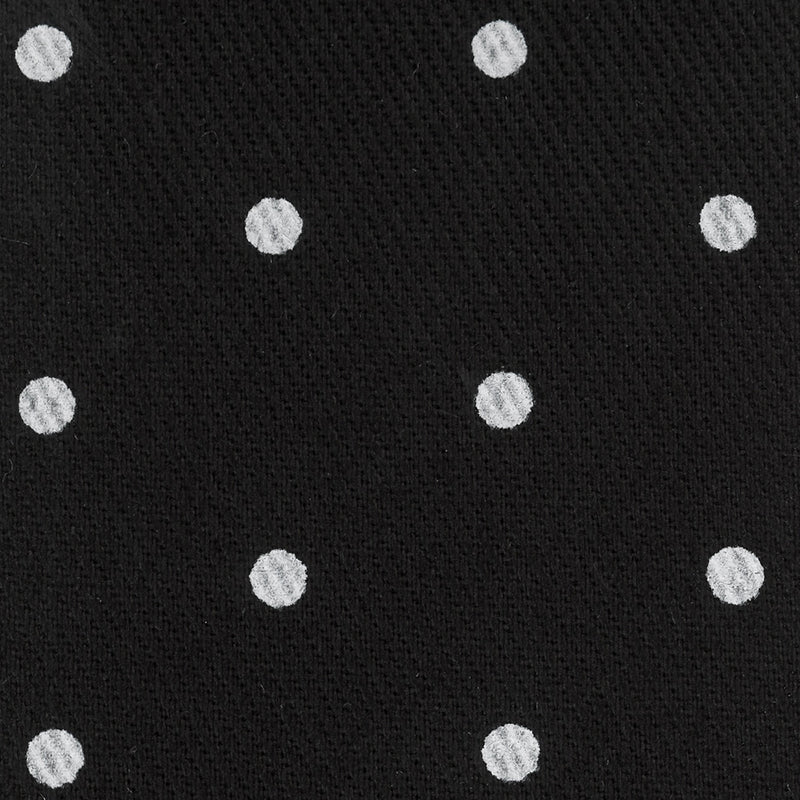 black fabric with white polka dots